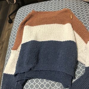 orange, white, and blue sweater, cropped
